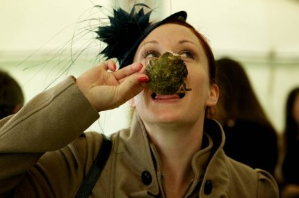 Woman eating Galway Oysters